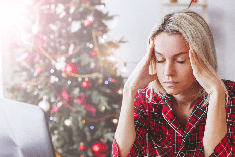 woman looking stressed during the holidays