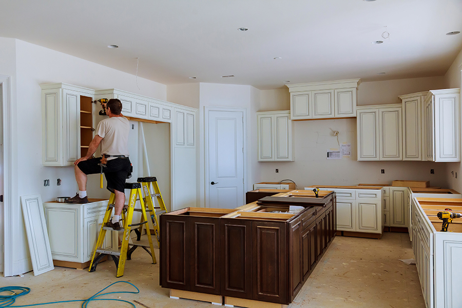 contractor remodeling kitchen after owner obtained a HELOC to finance project