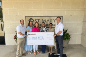 BankSouth team donating $100,000 check to St Mary’s Hospital