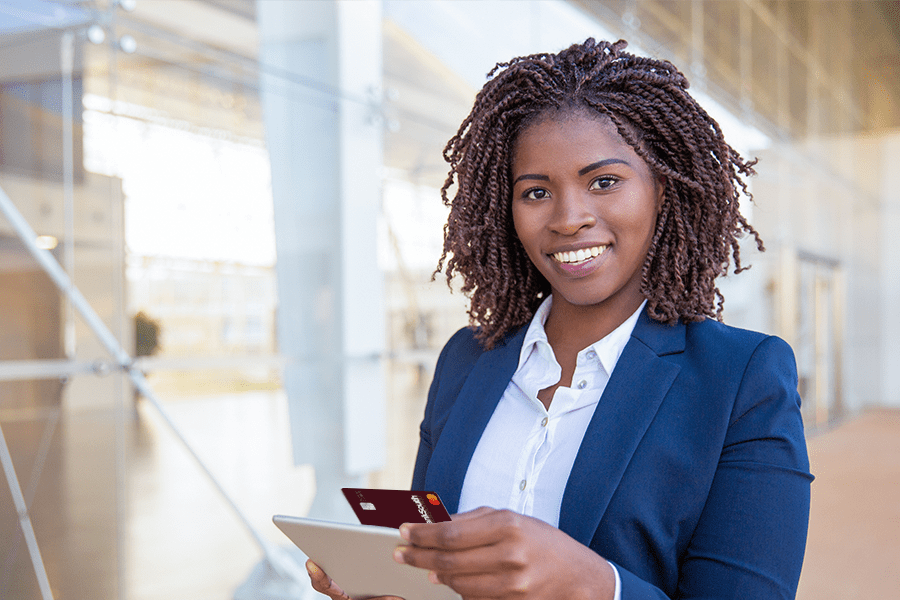 business woman using a business credit card