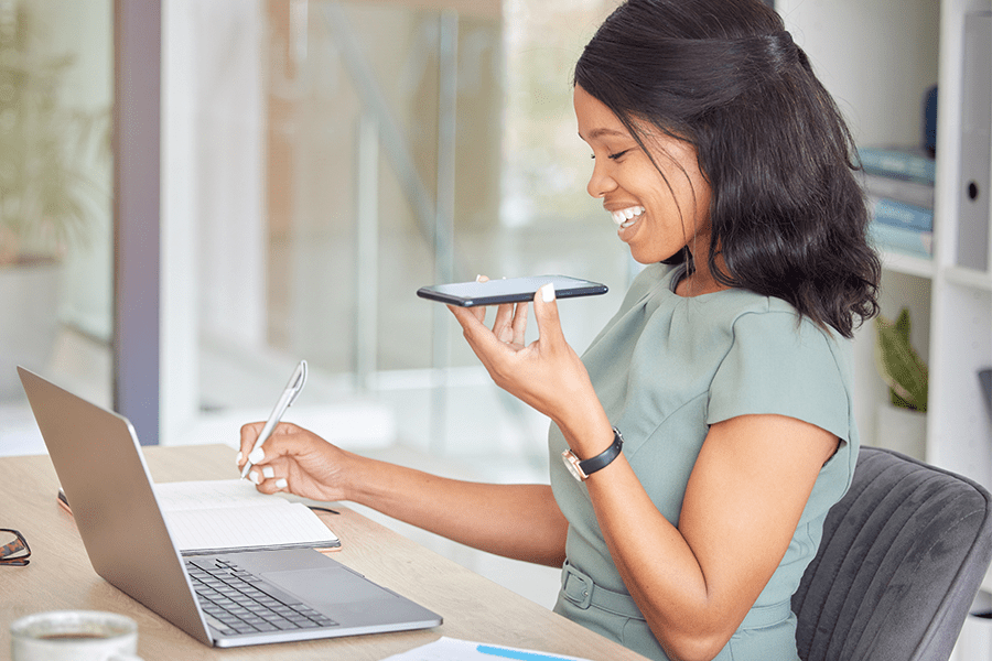 woman working on business finances with the bank on the phone