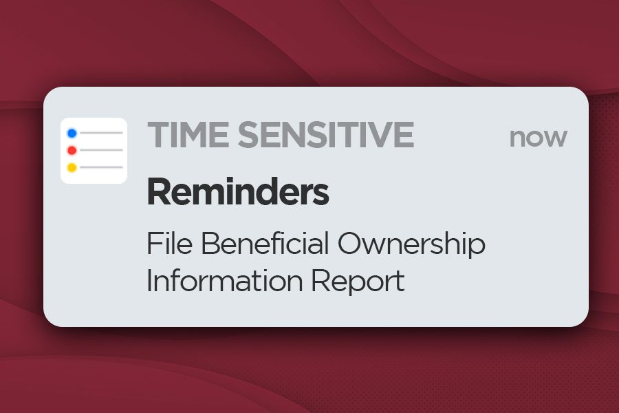 Notification card labeled 'Time Sensitive' with the text 'Reminders: File Beneficial Ownership Information Report' on a light gray background, set against a maroon backdrop.