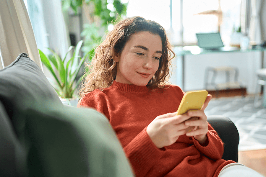 young woman banking on her cell phone